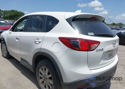 2014 Mazda Cx-5 Sport from USA, damaged, VIN JM3KE2BEXE0381157